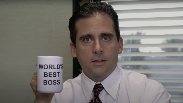 Steve Karel's Michael Socquet has a mug that says the best head of the world in the office speaking from the office