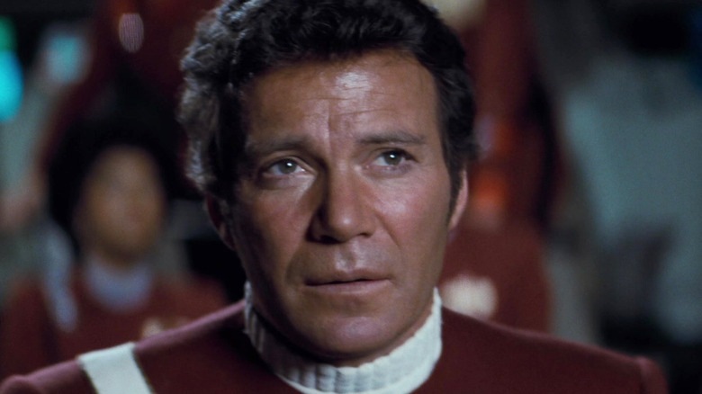 Kirk stands on the bridge of the Enterprise in Star Trek II: The Wrath of Khan