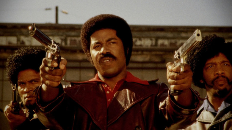 Chris Spencer, Michael Jai White, and Byron Minns star in Black Dynamite (2009)