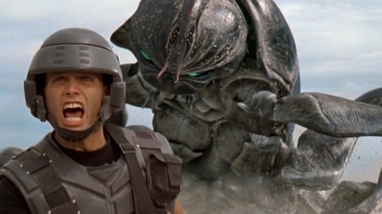 Marine Runs from Bug in Starship Troopers