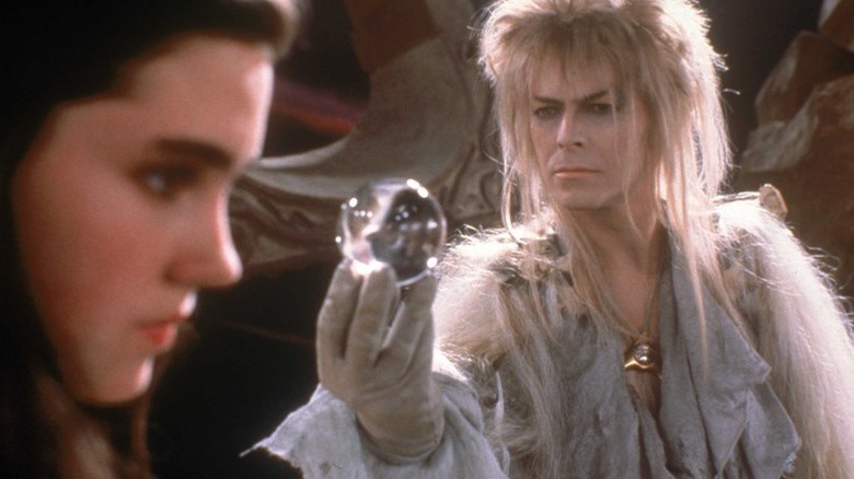 Jareth handing orb to Sarah