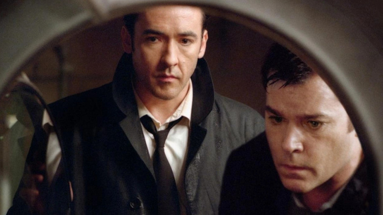 John Cusack and Ray Liotta in Identity 