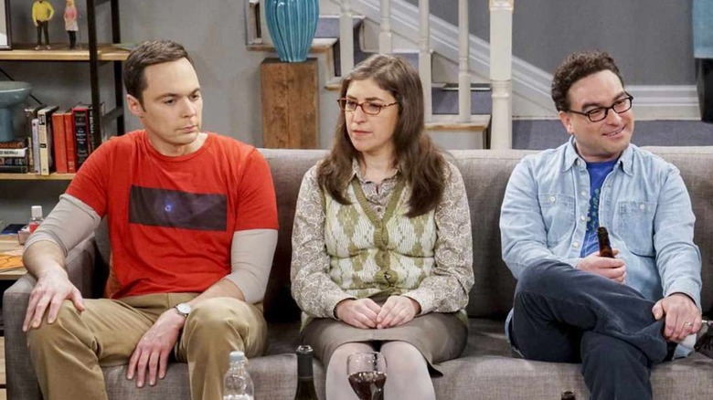 Sheldon Amy Leonard and Penny sitting in Howard and Bernadette's living room on The Big Bang Theory