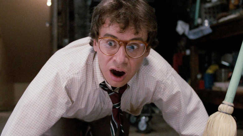 Rick Moranis as Wayne Szalinski looking horrified in Honey, I Shrunk the Kids