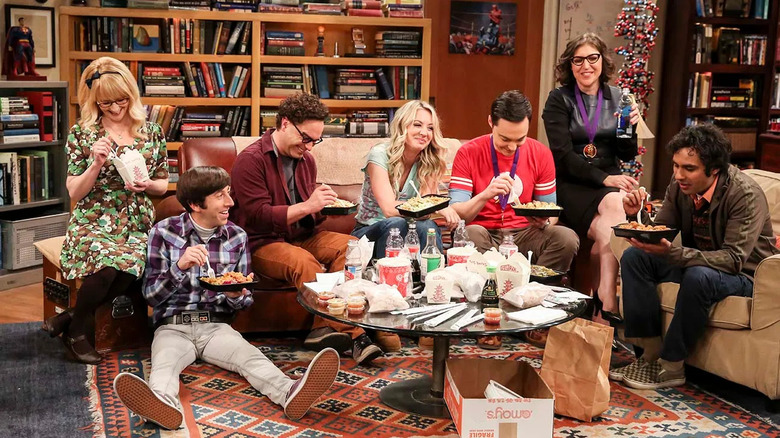 Cast of Big Bang Theory eating on couch in finale