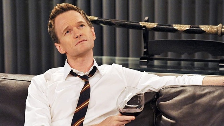 Barney in thought drinking wine How I Met Your Mother