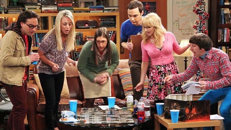 Whole Big Bang Theory gang looking at game