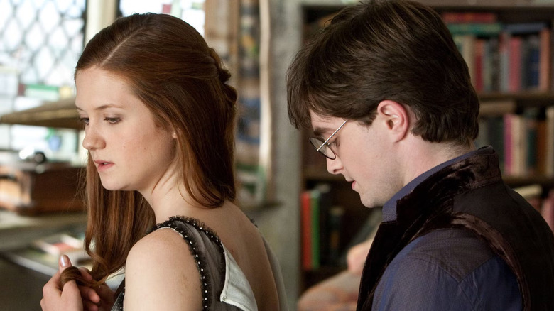 Harry buttoning the back of Ginny's dress in Harry Potter and the Deathly Hallows: Part 1