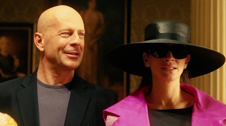 Bruce Willis appears as himself standing alongside Julia Roberts' Tess Ocean in Ocean's Twleve