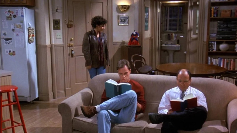 Julia Louis-Dreyfus as Elaine, Tim DeKay as Kevin, and Kyle T. Heffner as Gene on Seinfeld