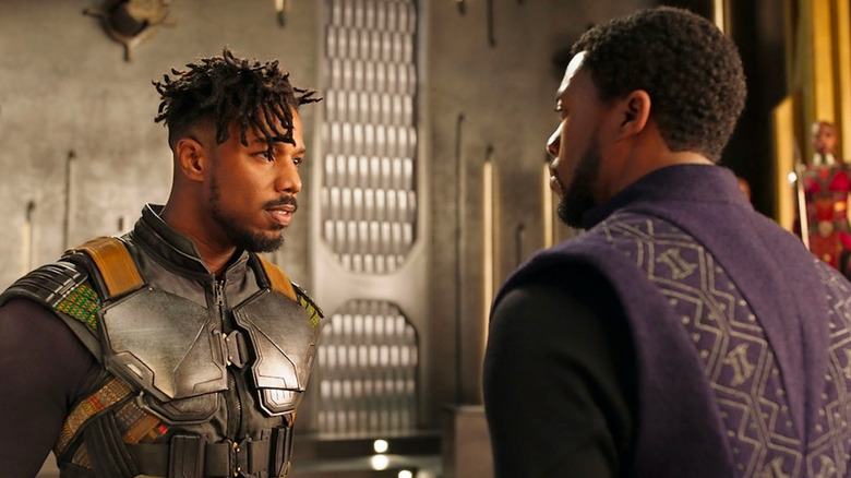 Michael B. Jordan as Erik "Killmonger" Stevens and Chadwick Boseman as King T'Challa in Black Panther