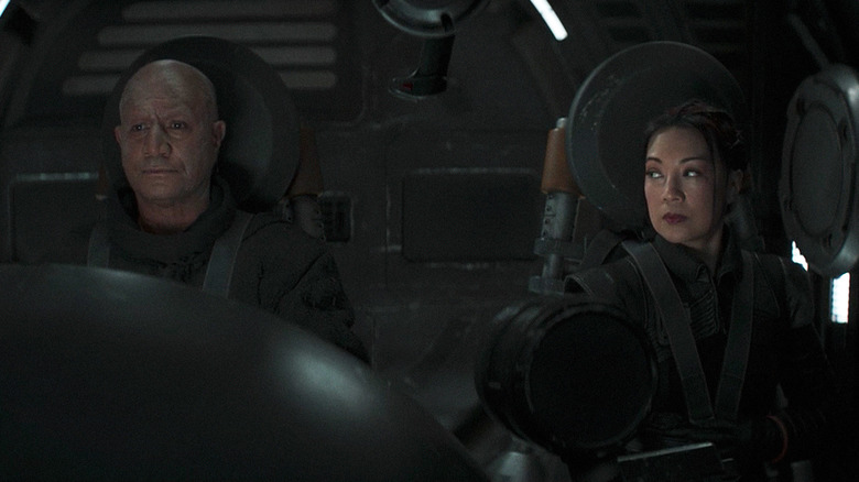 Fennec (Wen) and Boba Fett (Temuera Morrison) on board Fett's ship