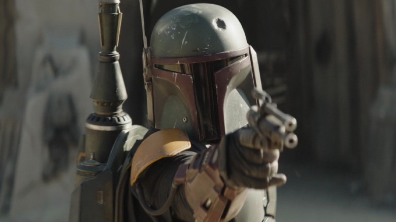 Boba pointing a gun in The Book of Boba Fett