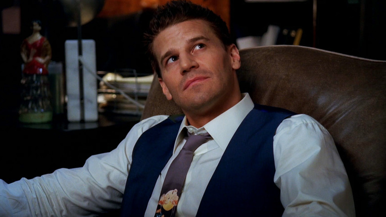 David Boreanaz's Seeley Booth looks up as he sits in a chair in Bones