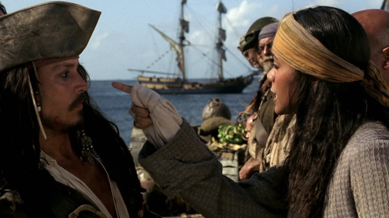 Anamaria pointing at Jack Sparrow in Pirates of the Caribbean Curse of the Black Pearl