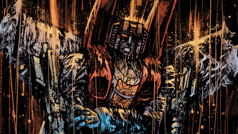 A damaged Starscream on the cover of Transformers #13