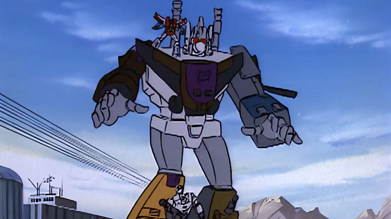 Bruticus chases Megatron in The Transformers