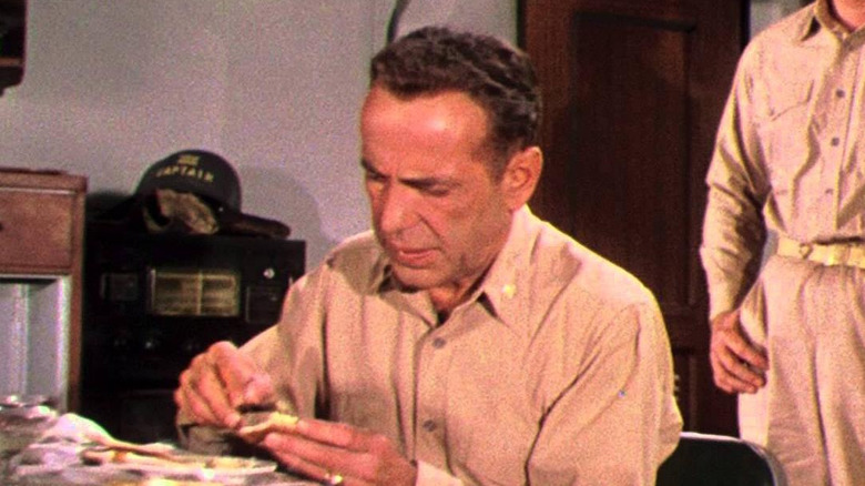 Humphrey Bogart buttering toast in The Caine Mutiny 