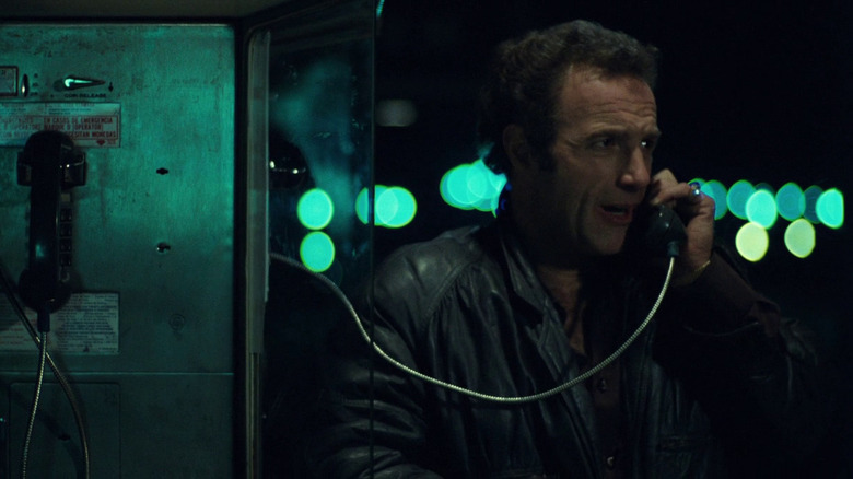 Thief James Caan on pay phone