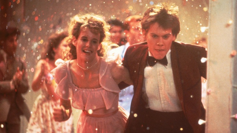 Kevin Bacon's Ren dancing with Lori Singer's Ariel at the end of Footloose (1984)