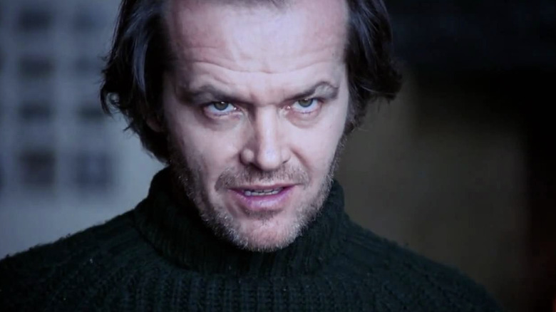 Jack Nicholson as Jack Torrance staring off in The Shining