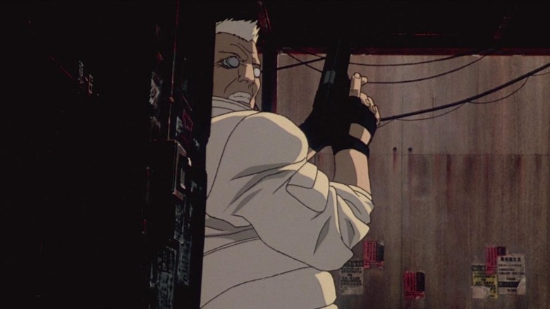 Batou lurks with gun in Ghost in the Shell