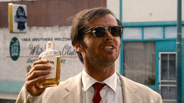 George Hanson raises a fifth of Jim Beam in Easy Rider