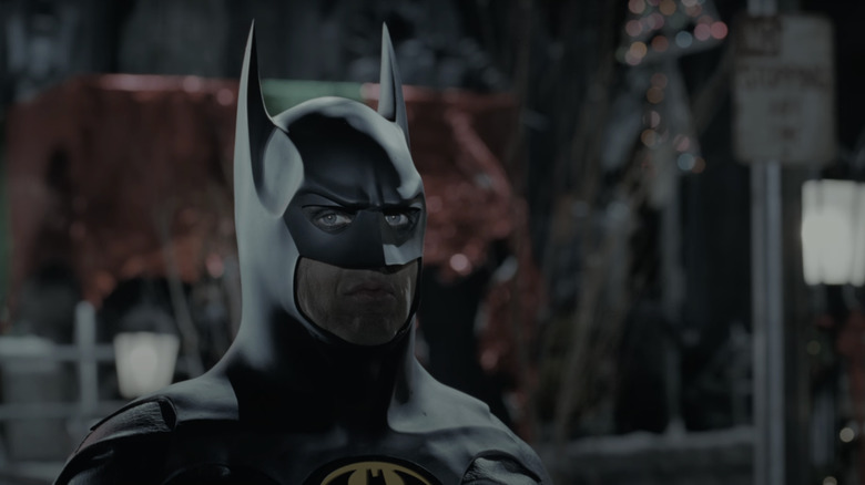 Michael Keaton's Batman stands in a Gotham street in Batman Returns