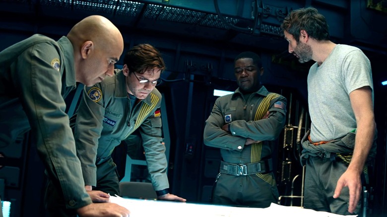 Cloverfield Paradox crew conferring