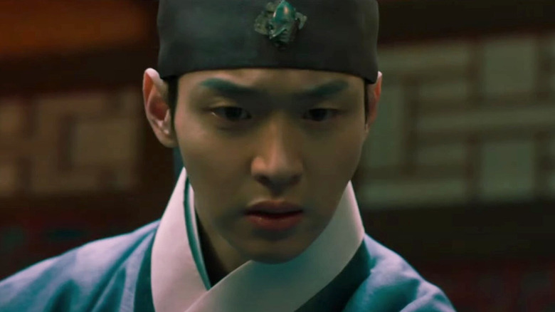 Prince Chungnyung (Jang Dong-yoon) stars intently in Joseon Exorcist