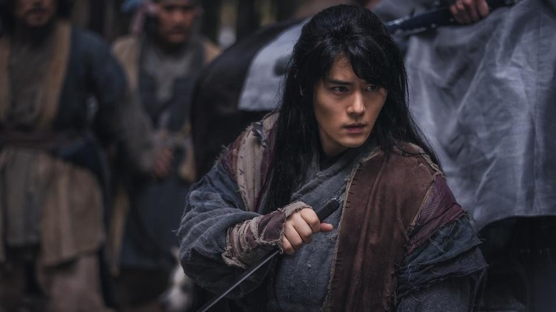 Byeo Ri (Kim Dong-jun) readies a sword in Joseon Exorcist