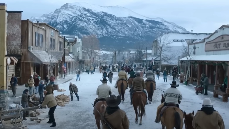 People riding horses through Jackson