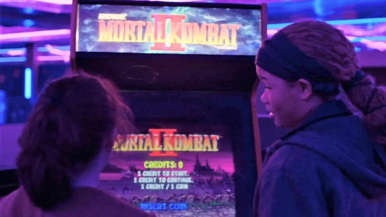 Ellie and Riley playing Mortal Kombat II