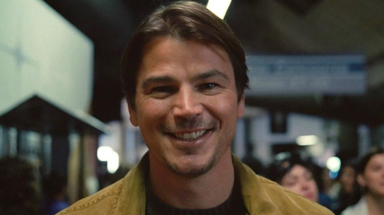 Josh Hartnett smiling in Trap (2024)