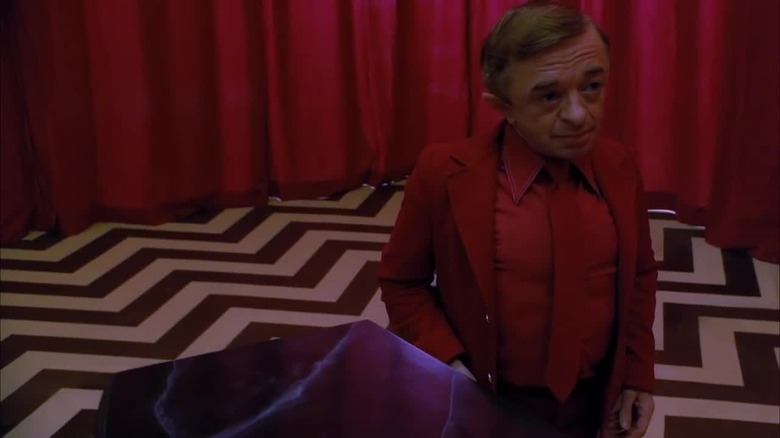 The Man From Another Place, AKA the Arm, appears in the Red Room in Fire Walk With Me