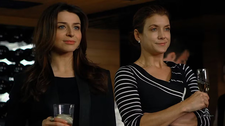 Amelia and Addison watching and smiling on Private Practice