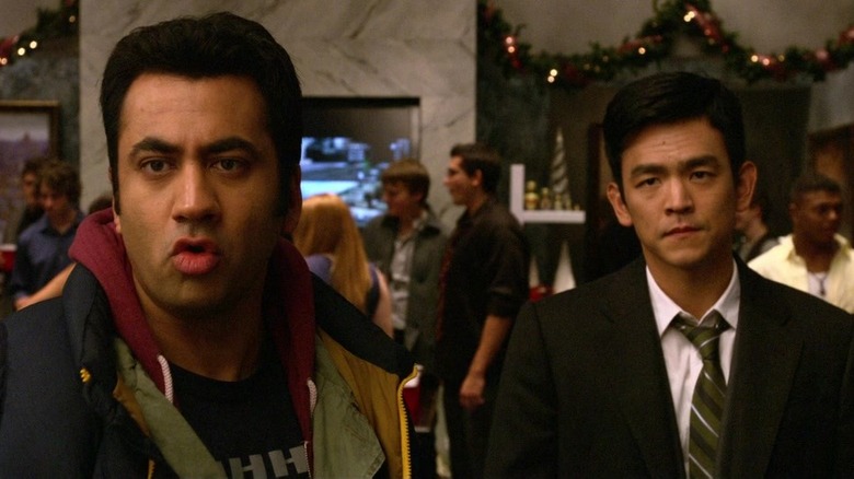 Harold and Kumar at a holiday party in A Very Harold & Kumar Christmas