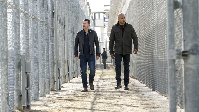 G. Callen and Sam Hanna walking around a prison in NCIS: Los Angeles