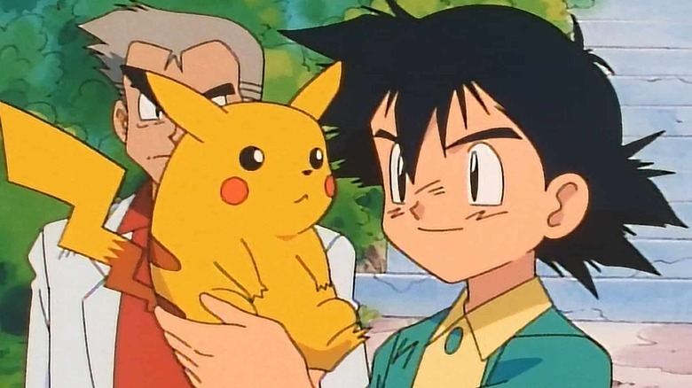 Ash Ketchum holding a Pikachu in Pokémon: Indigo League