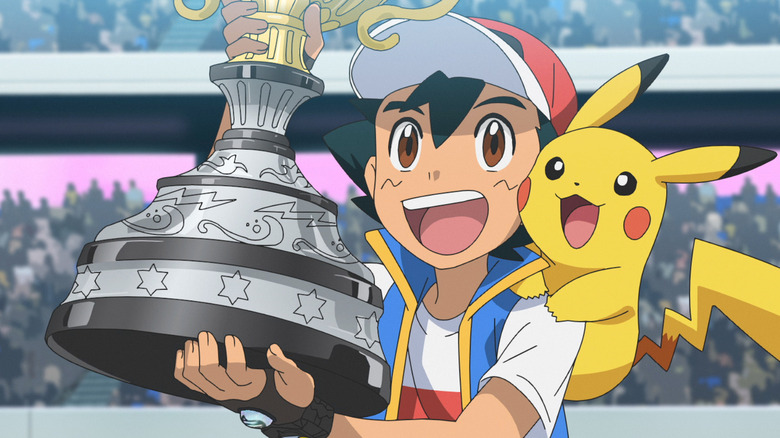 Ash memegang secangkir dengan Pikachu berdiri di pundaknya di Pokémon Ultimate Journeys