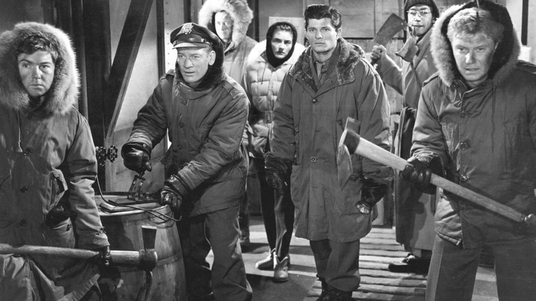 The Arctic research crew gathered together in The Thing From Another World