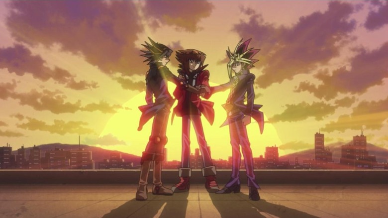 Judai, Yugi, and Yusei saying goodbye to each other in Yu-Gi-Oh! Bonds Beyond Time