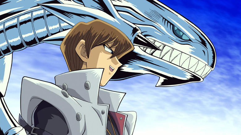 Seto Kaiba smiling while summoning the Blue-Eyes White Dragon in Yu-Gi-Oh! The Movie: Pyramid of Light