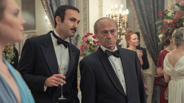 Khalid Abdalla as Dodi Fayed and Salim Dau as Mohamed al-Fayed in The Crown