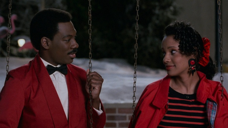 Eddie Murphy and Shari Headly in Coming to America