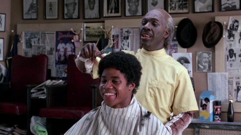 Eddie Murphy in Rick Baker Makeup as the Barber in Coming to America