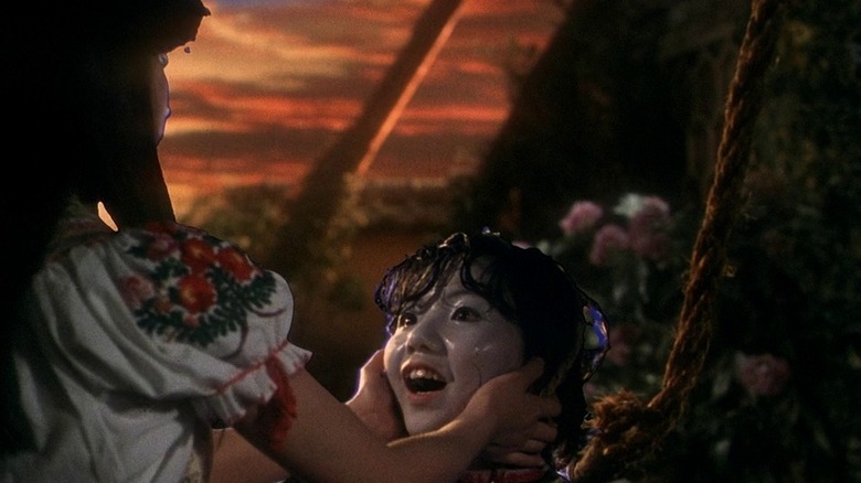 hausu fantasy holds mac's severed head