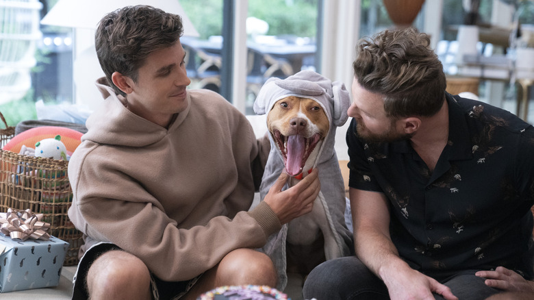 Antoni Porowski and Bobby Berk with puppy friend in an elephant costume in Queer Eye