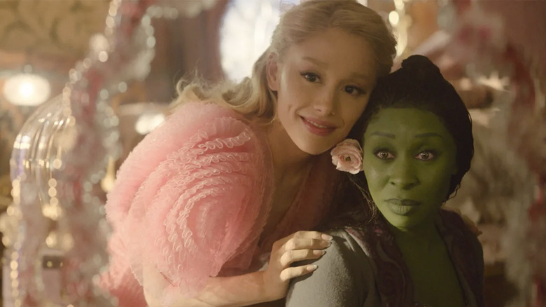 Ariana Grande as Glinda and Cynthia Erivo as Elphaba in Wicked looking into the mirror together