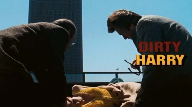 Opening credits, Harry Callahan and another detective investigate a murder